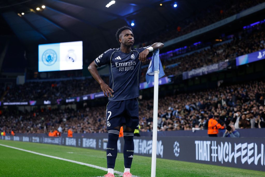 Vini-led Real Madrid complete the double over Man City to reach quarters