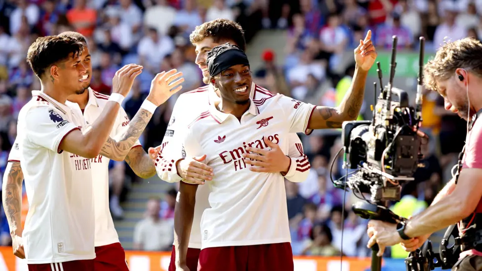 Arsenal start reign as champions with routine win at Palace